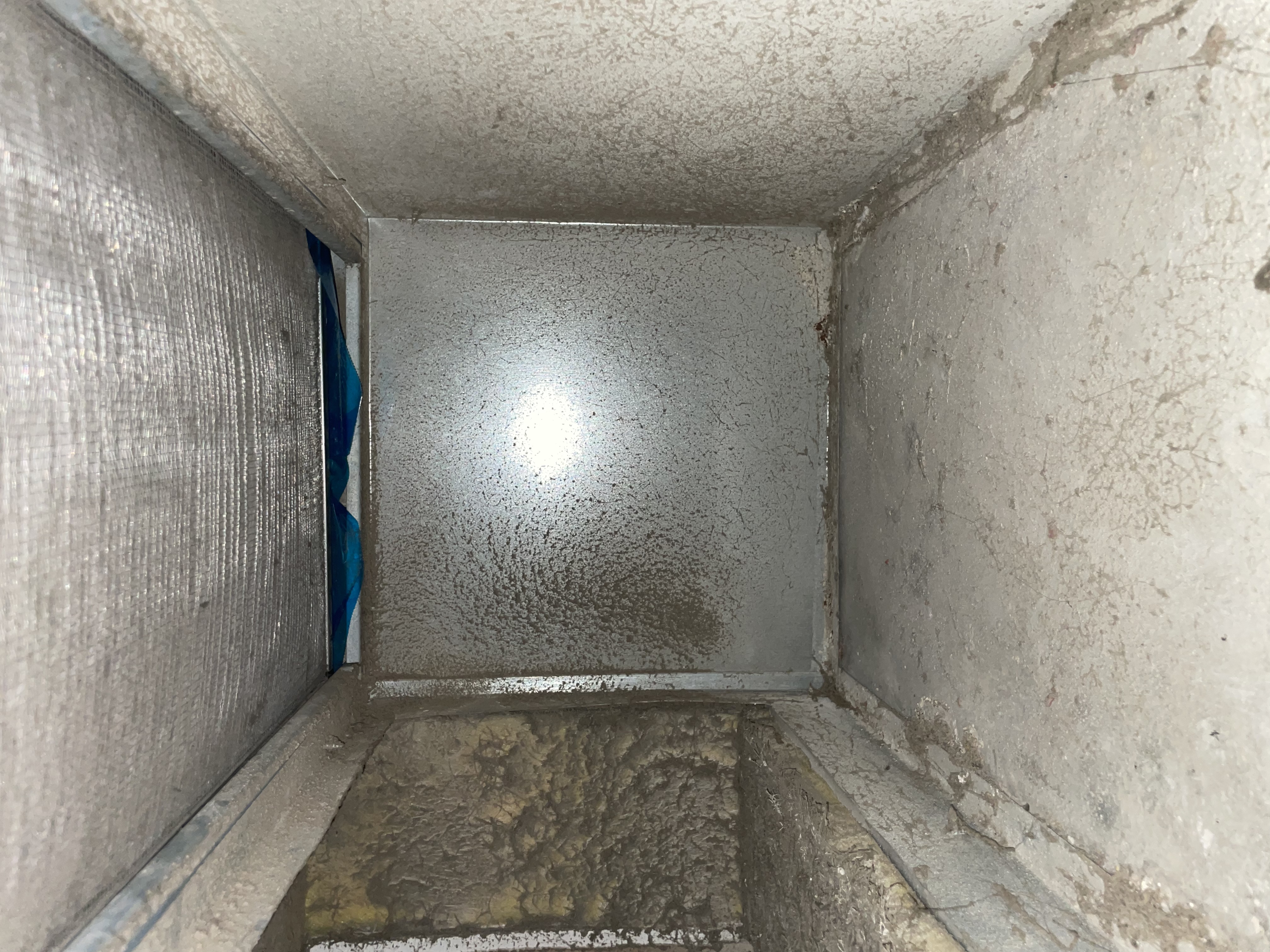 Dirty air duct trunk line before professional cleaning